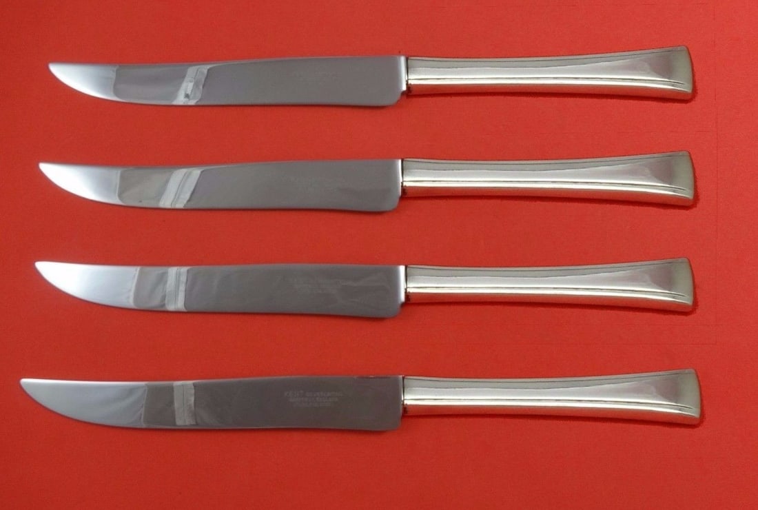 International Tranquility Sterling Silver Steak Knife Set 4-Piece Texas Size: International Tranquility Sterling Silver Steak Knife Set 4-Piece Texas Size This exquisite 4-piece steak knife set features the elegant Tranquility pattern by International Sterling. Crafted from ste
