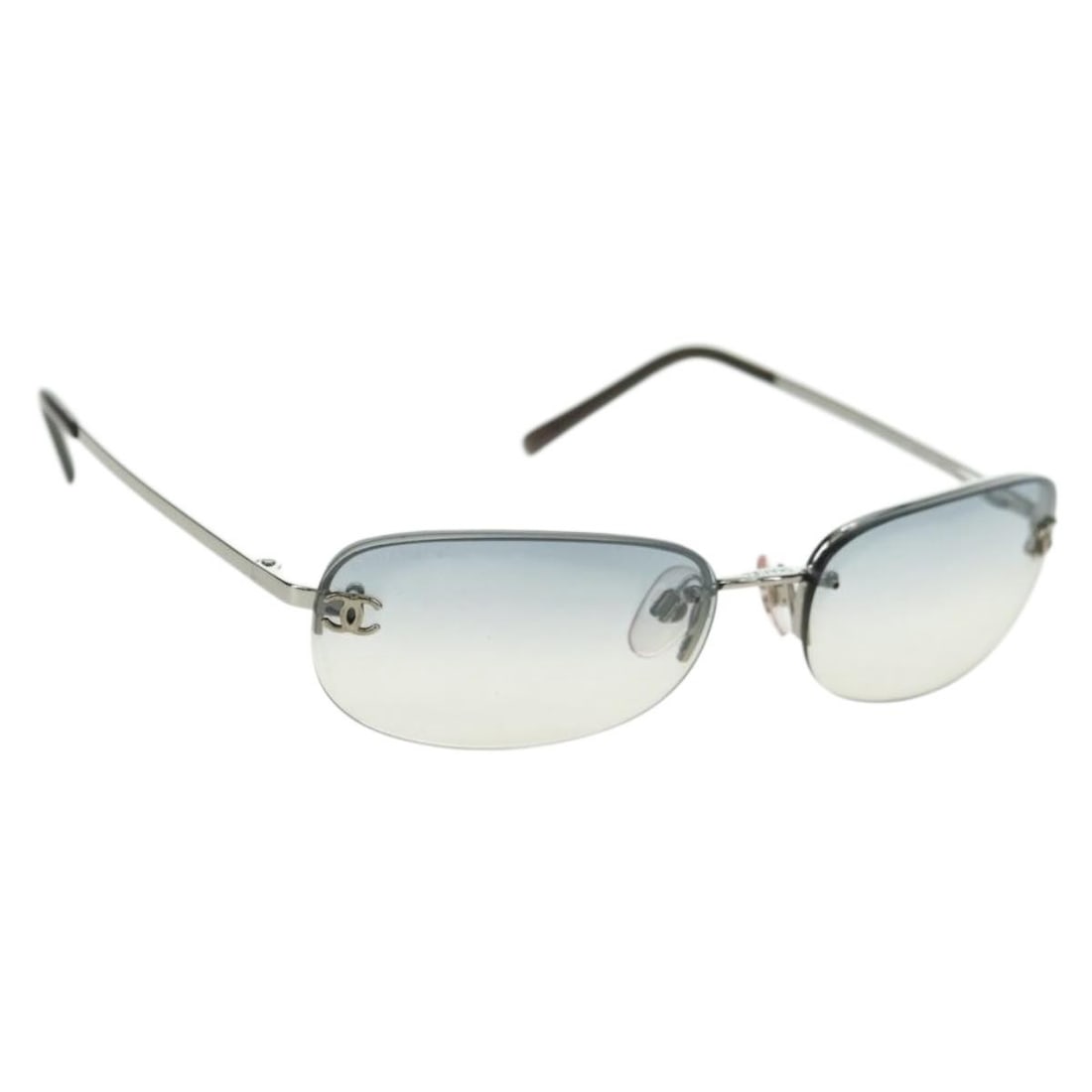 CHANEL Coco Mark Silver Metal Sunglasses with Case: CHANEL Coco Mark Silver Metal Sunglasses with Case Authentic CHANEL COCO Mark sunglasses in silver-tone metal. Made in Italy, this women's style comes with a sunglass case. Condition is rated A, with 