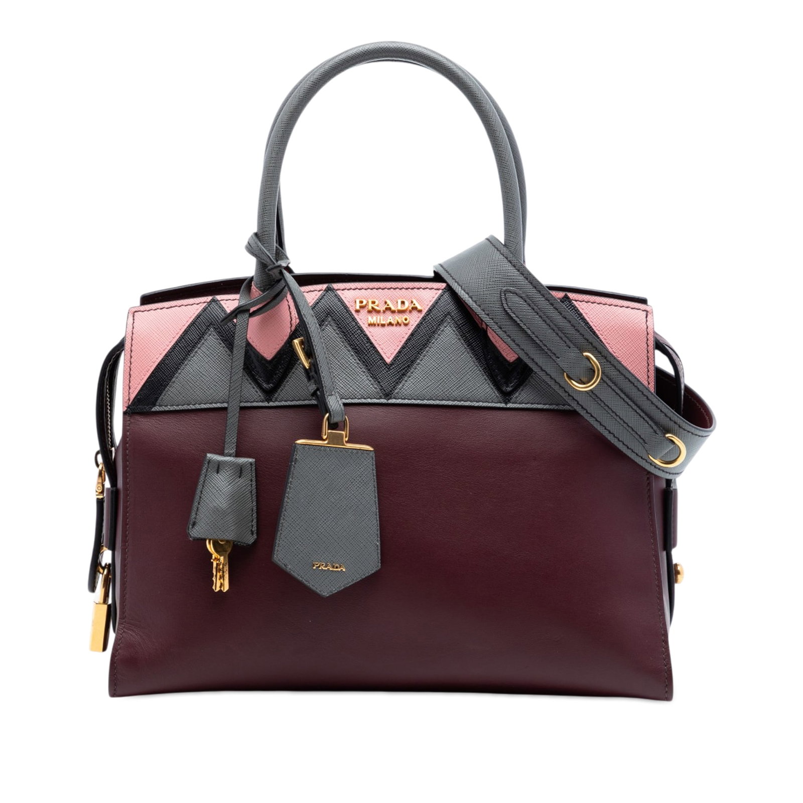 Prada Esplanade Medium Red Leather Satchel with Saffiano Trim: Prada Esplanade Medium Red Leather Satchel with Saffiano Trim This Prada Esplanade satchel is crafted in red leather with saffiano leather trim. The design features rolled top handles, a detachable fl