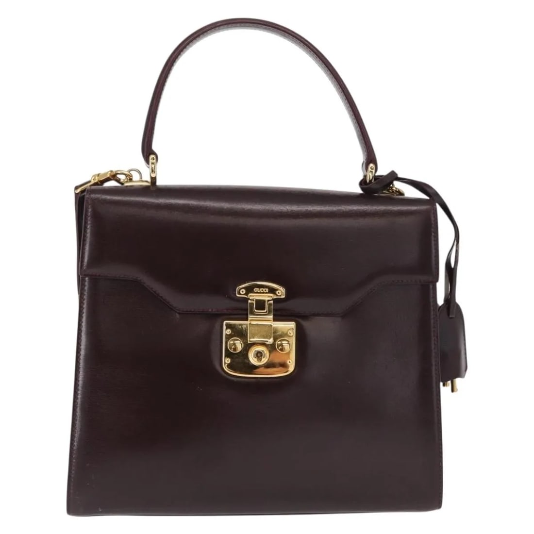 Gucci Lady Lock Burgundy Leather Vintage Top Handle Purse: Gucci Lady Lock Burgundy Leather Vintage Top Handle Purse The Gucci Vintage Lady Lock Top Handle Bag is crafted from burgundy leather and features a classic structured silhouette with a top handle. De