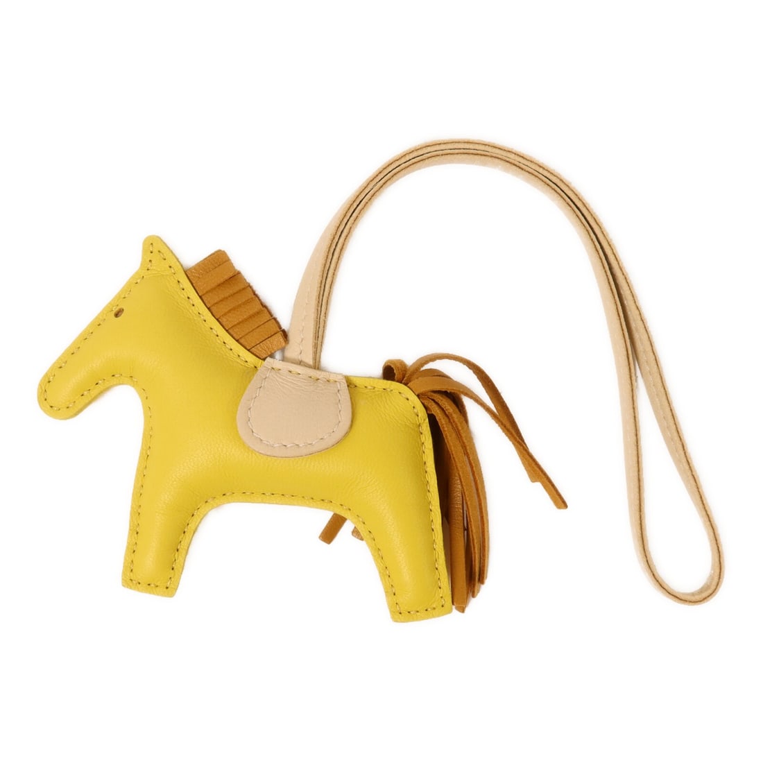 Hermes PM Rodeo charm in yellow calfskin: Hermes PM Rodeo charm in yellow calfskin Hermes Rodeo PM charm crafted from calfskin with a yellow colorway. This unisex accessory is made in France and is presented in very good condition. Specificat