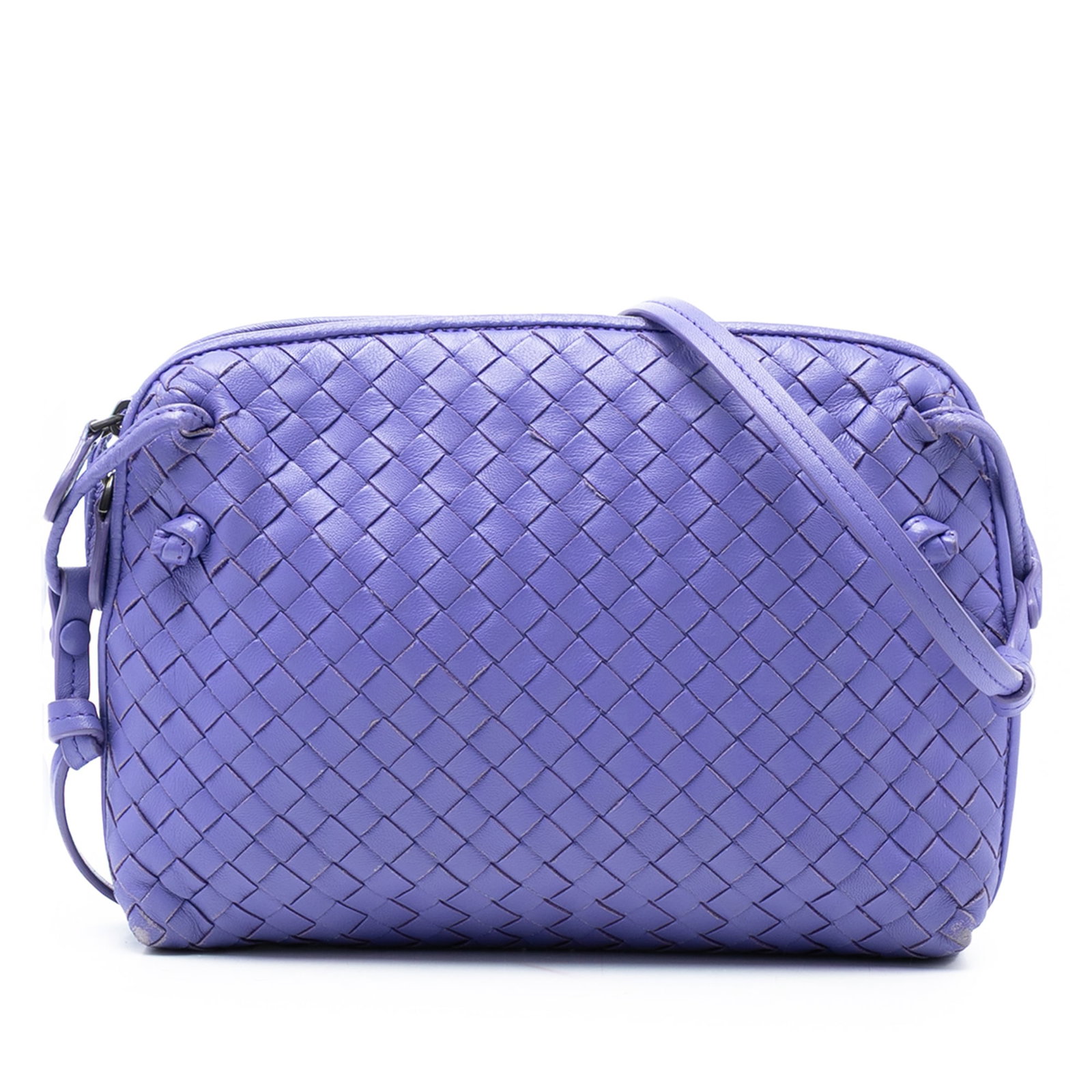 Purple Leather Intrecciato Nodini Crossbody Bottega Veneta: Purple Leather Intrecciato Nodini Crossbody Bottega Veneta This Bottega Veneta Nappa Intrecciato Nodini Crossbody features a signature woven leather exterior in purple, complemented by an adjustable f