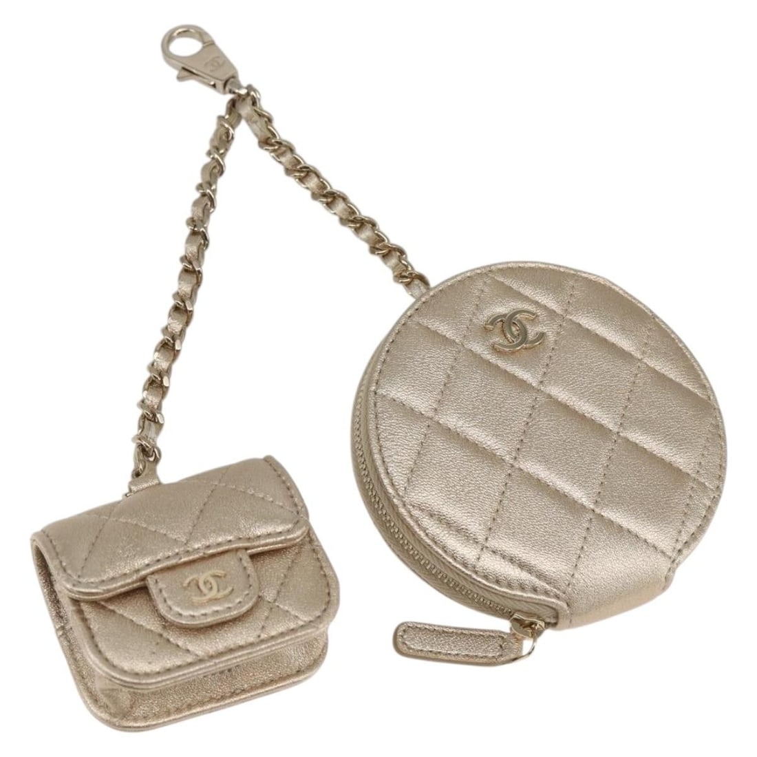 Chanel Matelasse Lambskin Gold Coin Purse AirPods Case with CC Logo: Chanel Matelasse Lambskin Gold Coin Purse AirPods Case with CC Logo This CHANEL Matelasse coin purse is crafted from luxurious lambskin leather in gold and features the iconic CC logo. Designed for ve