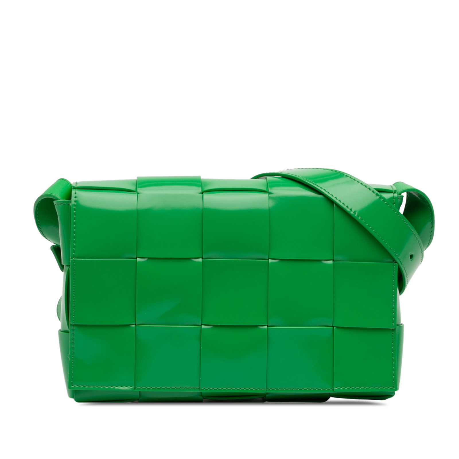 Green Patent Leather Cassette Crossbody Bag by Bottega Veneta: Green Patent Leather Cassette Crossbody Bag by Bottega Veneta This Bottega Veneta Cassette crossbody bag features a signature woven patent leather exterior in green, a flat leather strap, a front flap