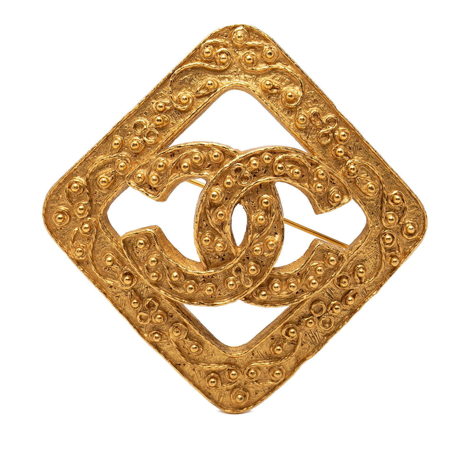 Chanel Gold Tone Rhombus CC Brooch: Chanel Gold Tone Rhombus CC Brooch This Chanel brooch showcases the iconic CC logo in a rhombus design, crafted from gold-tone metal. It features a secure back pin closure for easy attachment. The bro