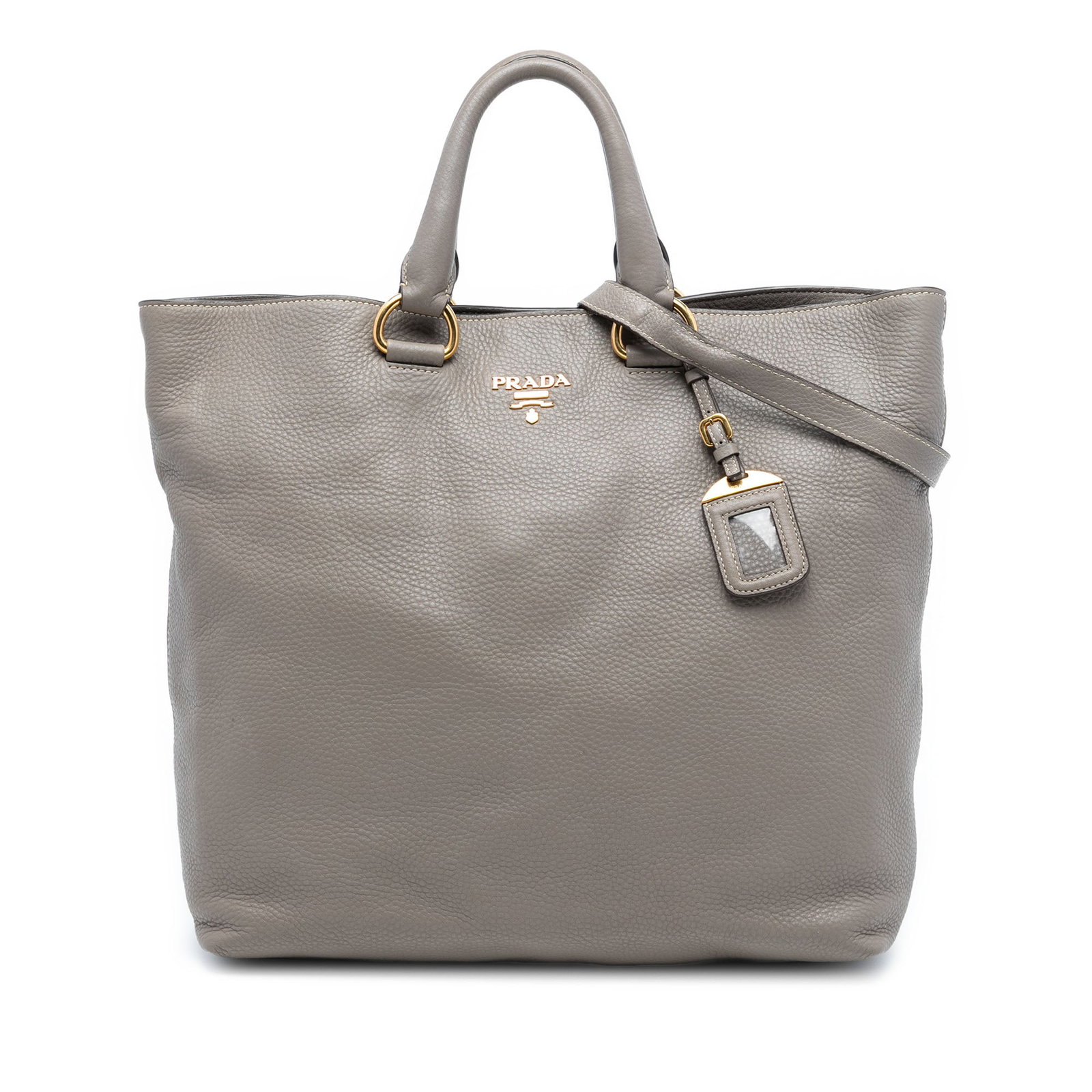 Gray Leather Satchel with Detachable Strap by Prada Vitello Daino: Gray Leather Satchel with Detachable Strap by Prada Vitello Daino This Prada Vitello Daino Open Convertible Tote features a gray leather body with rolled leather handles and a detachable flat leather 