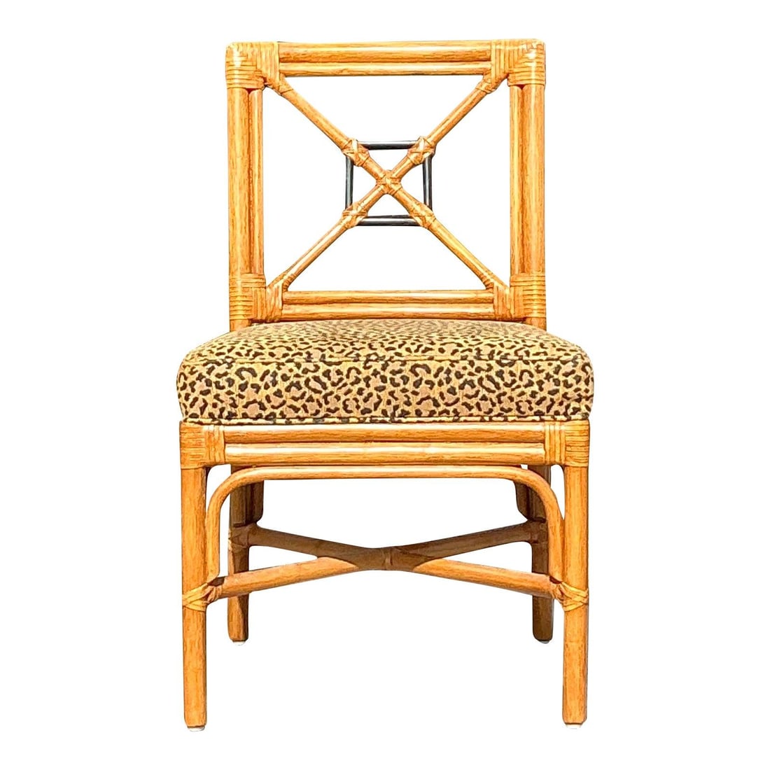 Vintage Rattan Side Chair with Target Back and Leopard Print Cushion: Vintage Rattan Side Chair with Target Back and Leopard Print Cushion Enhance your coastal or bohemian decor with this vintage rattan side chair, featuring an iconic target back design and a stylish le