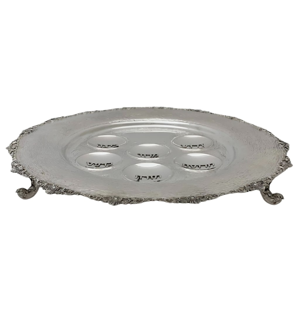 Handmade 925 Sterling Silver Modern Seder Plate 17 Inches: Handmade 925 Sterling Silver Modern Seder Plate 17 Inches This exquisite 3 leg Seder plate is crafted from fine 925 sterling silver, showcasing a modern and ornate striated design. Handmade in Turkey,