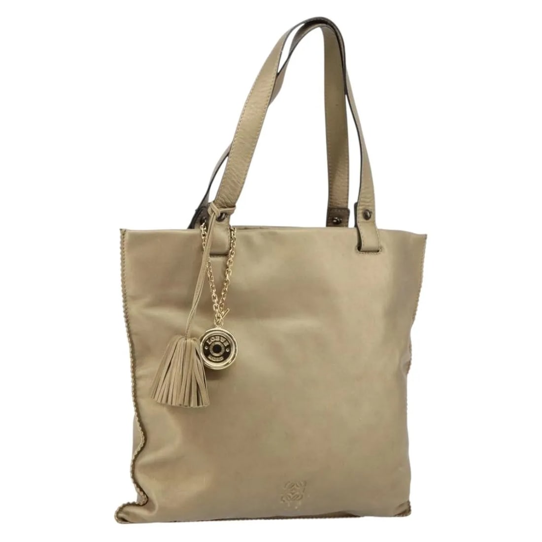 Gold Leather Tote Bag Loewe Anagram 33cm by 30cm by 30cm: Gold Leather Tote Bag Loewe Anagram 33cm by 30cm by 30cm This pre-owned Loewe Anagram Tote is crafted from gold leather and designed for women. The tote features a spacious interior with pockets and a