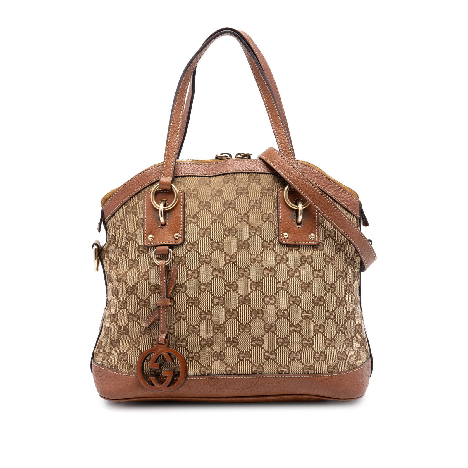 Gucci GG Canvas Dome Satchel with Leather Trim: Gucci GG Canvas Dome Satchel with Leather Trim This Gucci Medium GG Canvas Charm Dome Satchel features a beige canvas body with leather trim, flat leather handles, and a detachable flat leather should