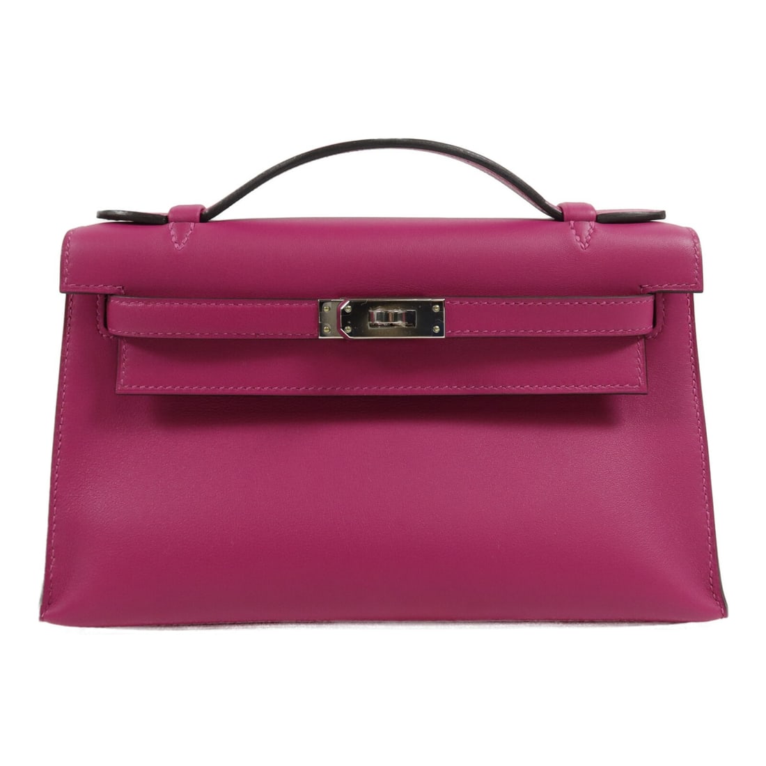 Hermes Kelly Pochette handbag in purple calfskin with palladium hardware: Hermes Kelly Pochette handbag in purple calfskin with palladium hardware Hermes Kelly Pochette handbag in purple calfskin with palladium-tone hardware. Made in France, this women's handbag is presente