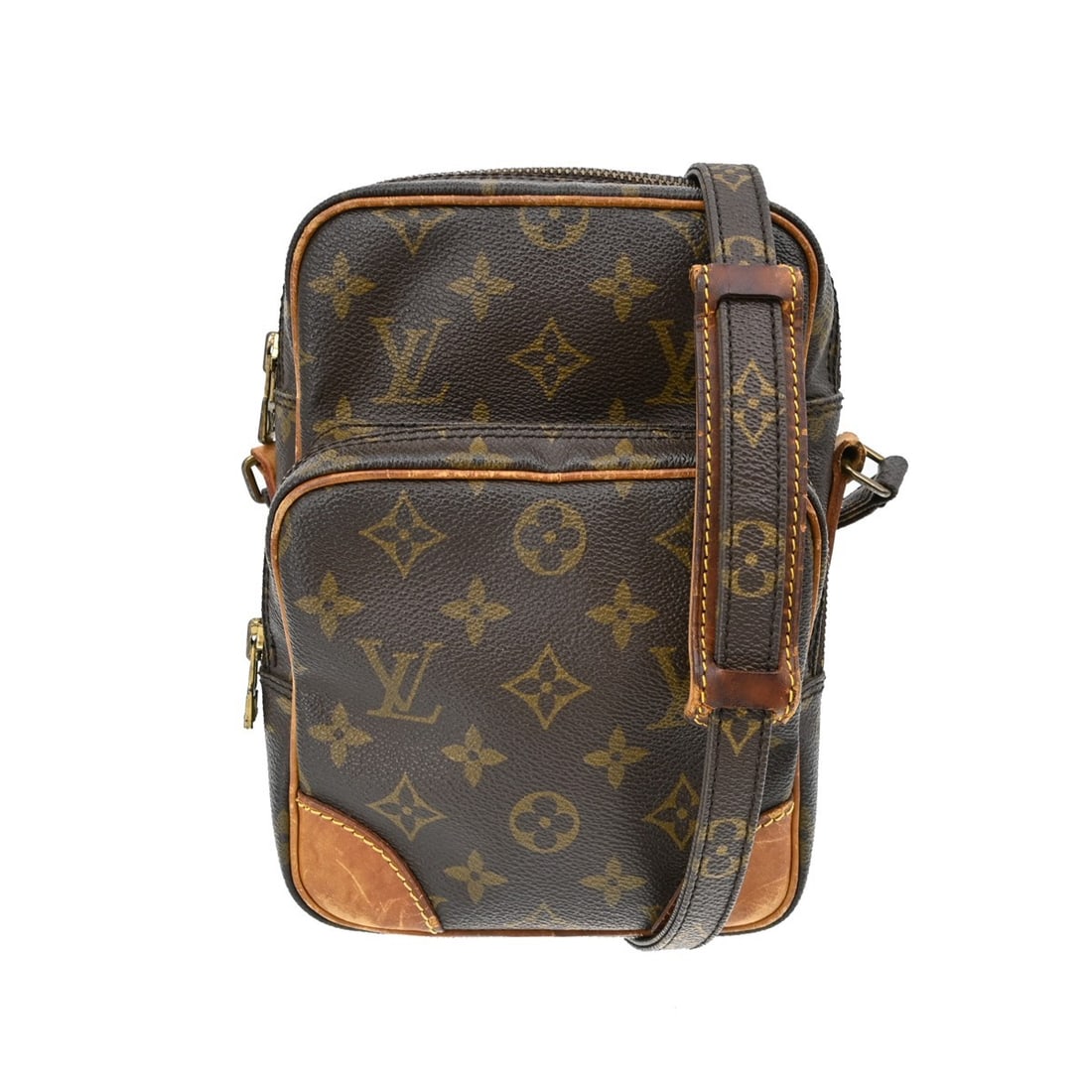 Louis Vuitton Amazone Monogram Canvas Crossbody Bag M45236: Louis Vuitton Amazone Monogram Canvas Crossbody Bag M45236 Vintage Louis Vuitton Amazon crossbody bag in brown Monogram canvas and leather with a zip closure and adjustable crossbody strap. This unise