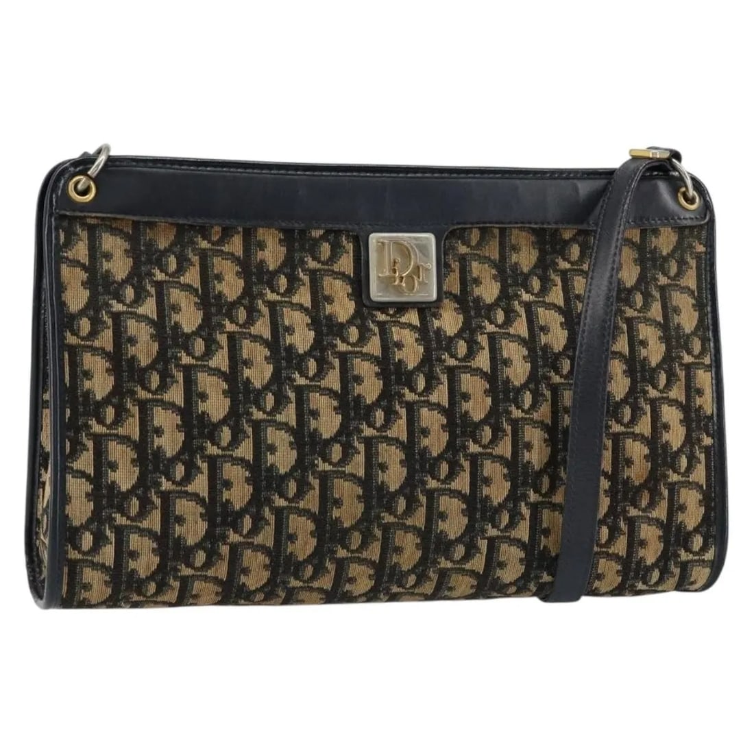 Christian Dior Vintage Trotter Shoulder Bag Navy Canvas: Christian Dior Vintage Trotter Shoulder Bag Navy Canvas This vintage Christian Dior Trotter shoulder bag features navy canvas construction with leather detailing. It shows signs of use including surfa