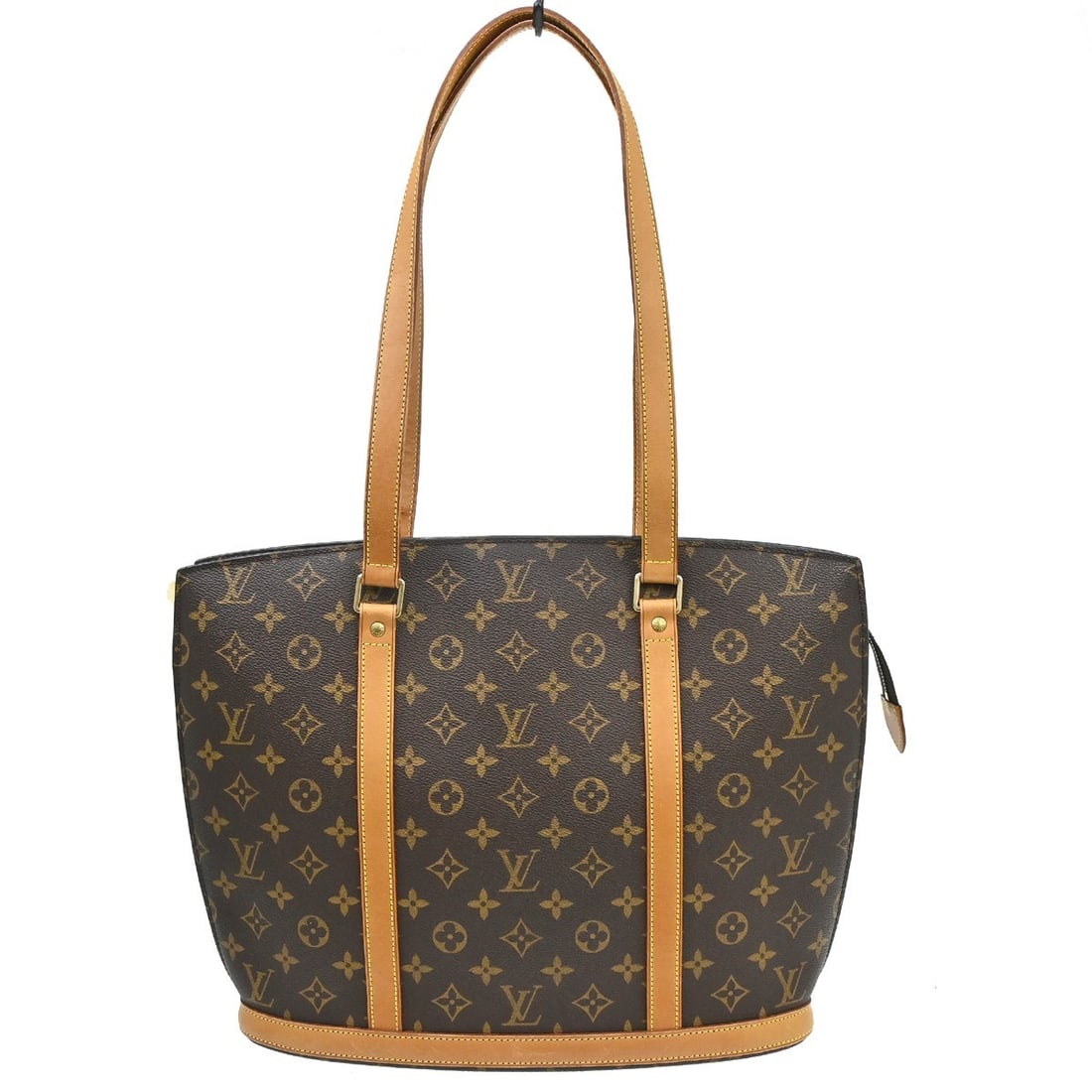 Louis Vuitton Babylone Monogram Canvas Tote Bag M51102: Louis Vuitton Babylone Monogram Canvas Tote Bag M51102 Vintage Louis Vuitton Babylone tote bag in brown Monogram canvas with leather trim and double leather handles. This large zip-top handbag feature