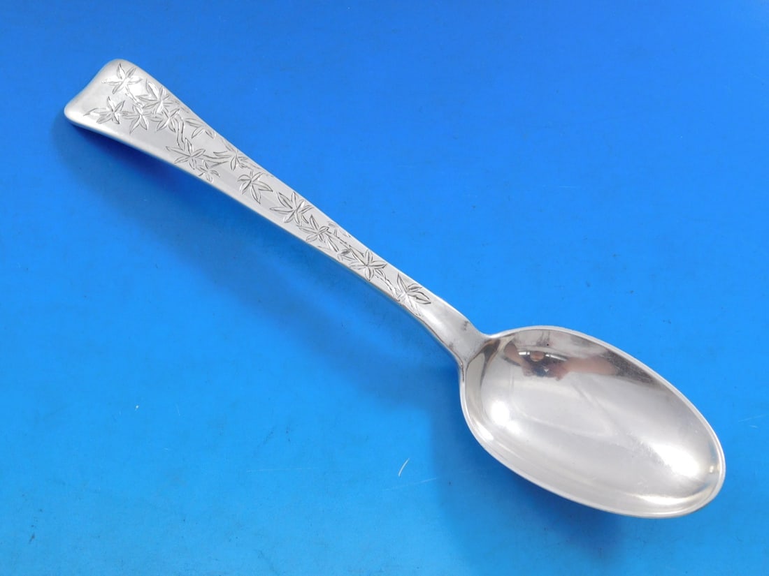 Tiffany Sterling Silver 7 Inch Lap Over Edge Soup Spoon with Floral Design: Tiffany Sterling Silver 7 Inch Lap Over Edge Soup Spoon with Floral Design This exquisite place soup spoon by Tiffany & Co. features the elegant Lap Over Edge pattern, showcasing intricate acid etched