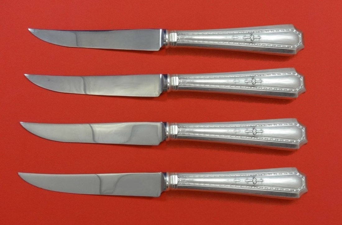 Durgin-Gorham Colfax Sterling Silver Steak Knife Set 4pc Custom 8.5": Durgin-Gorham Colfax Sterling Silver Steak Knife Set 4pc Custom 8.5" Elevate your dining experience with this exquisite 4-piece steak knife set from the Colfax pattern by Durgin-Gorham. Crafted from s