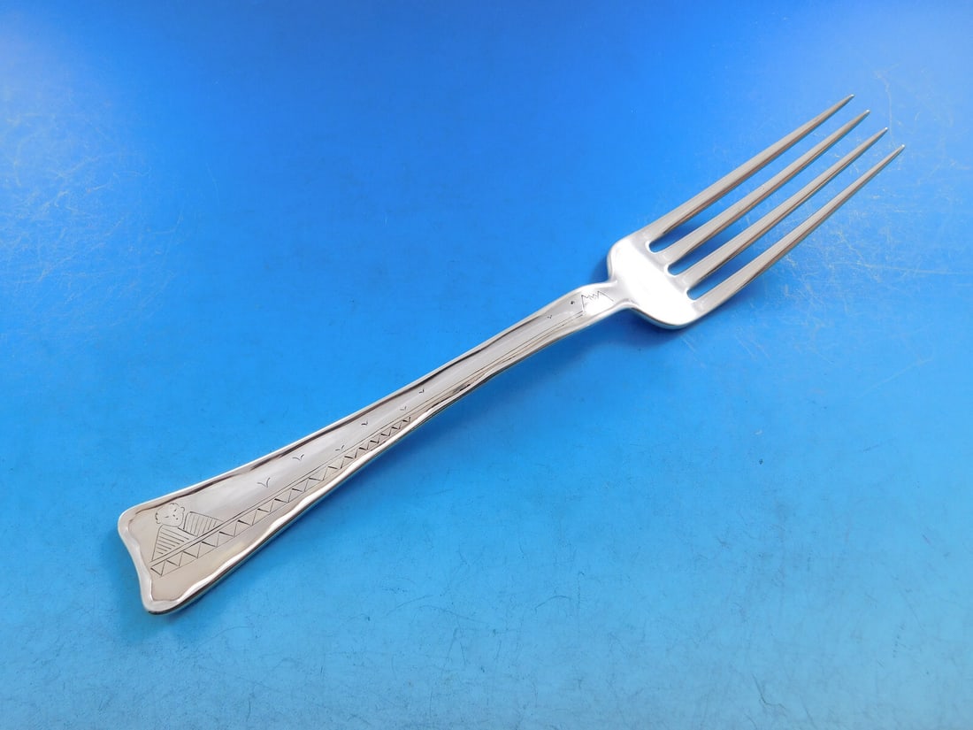 Tiffany & Co. Lap Over Edge Sterling Silver Fork with Chinese Design 8": Tiffany & Co. Lap Over Edge Sterling Silver Fork with Chinese Design 8" This exquisite dinner fork is a stunning example of the Lap Over Edge pattern by Tiffany & Co., crafted from high-quality sterli