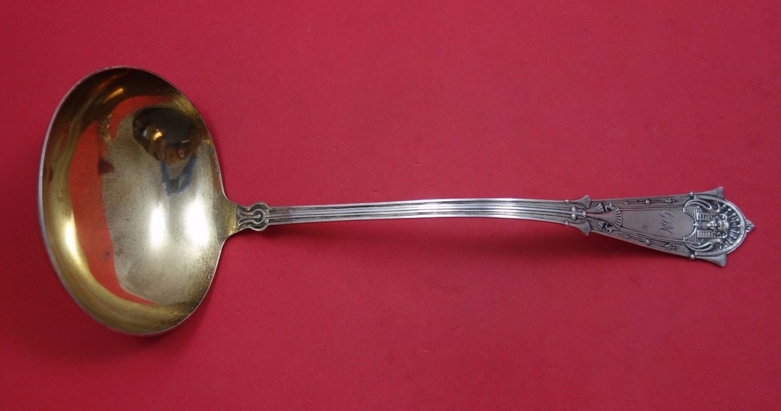 Whiting Egyptian Sterling Silver Gold Washed Soup Ladle 12 Inch: Whiting Egyptian Sterling Silver Gold Washed Soup Ladle 12 Inch Discover the elegance of the Egyptian by Whiting Sterling Silver Soup Ladle. Crafted from high-quality sterling silver and featuring a g