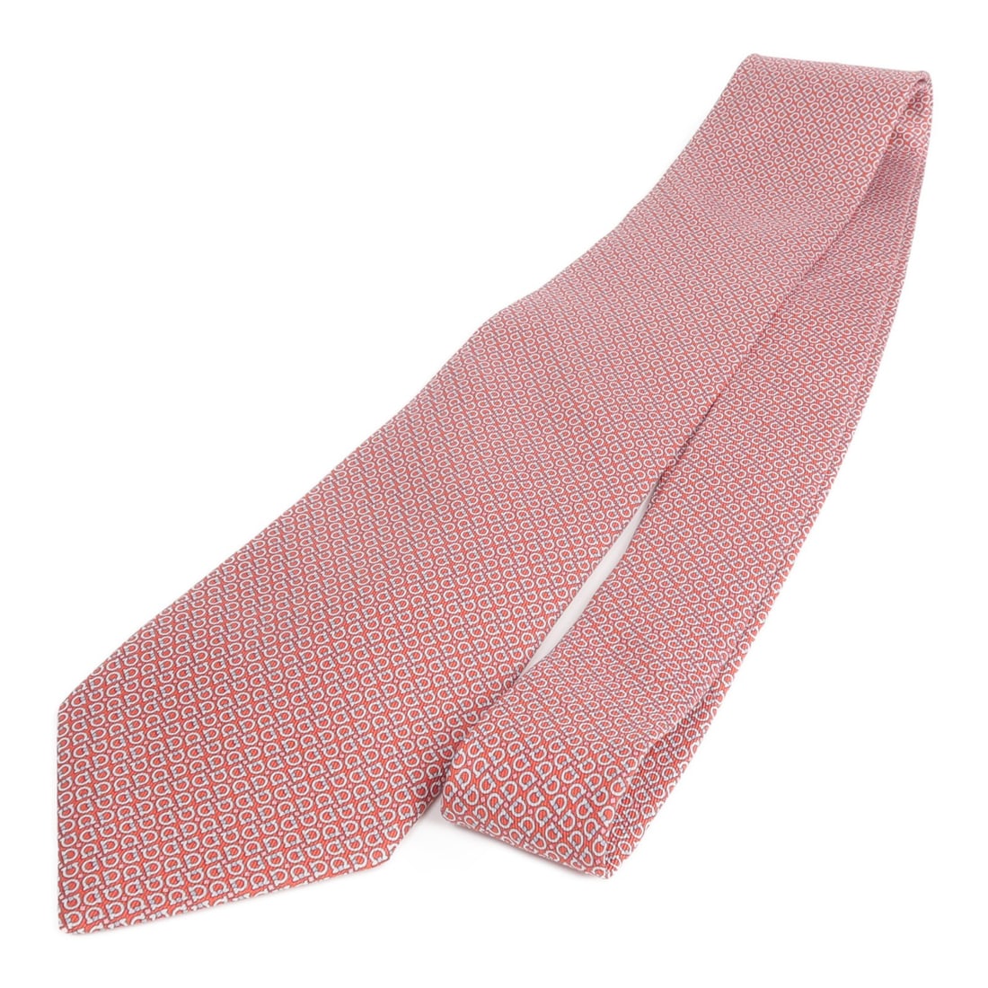 Silk Red Neck Tie by Salvatore Ferragamo for Men: Silk Red Neck Tie by Salvatore Ferragamo for Men This Salvatore Ferragamo men's tie is crafted from fine silk in a striking red color. Made in Italy, it offers a classic and sophisticated accessory fo