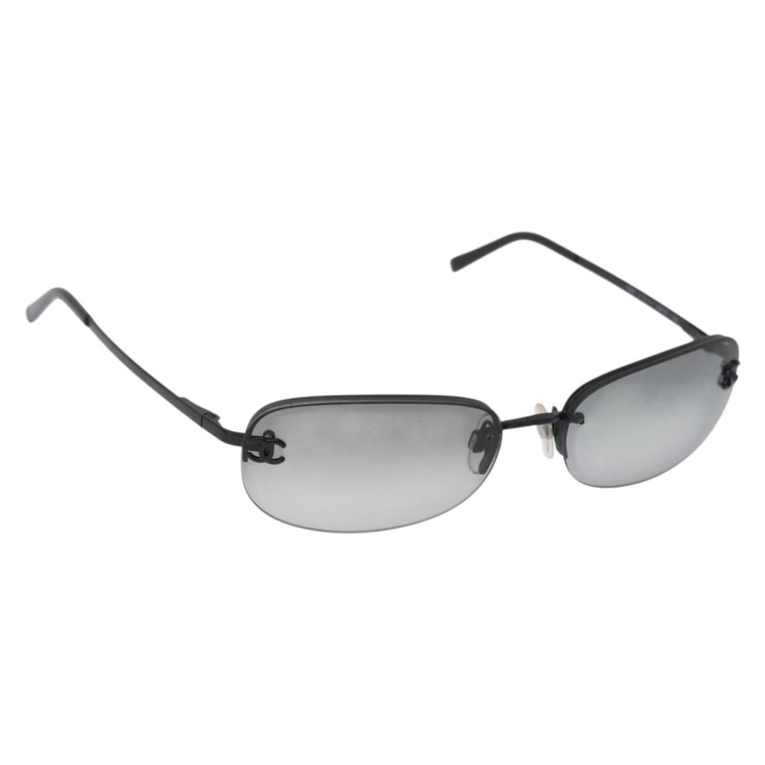 CHANEL Black Metal CC Womens Sunglasses Made in Italy: CHANEL Black Metal CC Womens Sunglasses Made in Italy Authentic Chanel CC sunglasses in black metal with a streamlined design. Made in Italy, this women's pair is offered in excellent condition with n