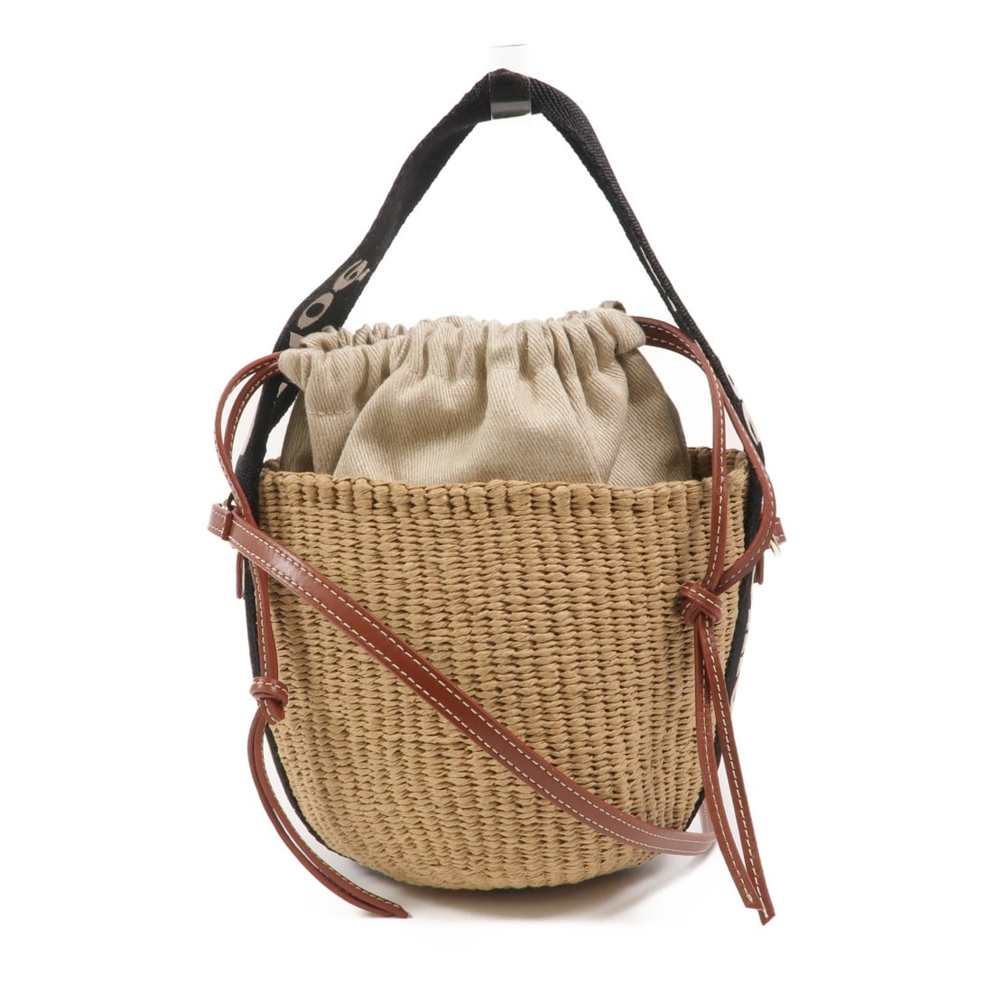Chloe Woody Small 2 Way Shoulder Bag Brown Raffia: Chloe Woody Small 2 Way Shoulder Bag Brown Raffia A Chloe Small Woody basket-style 2-way shoulder bag in brown. Designed for women, this piece is made in raffia and presented in very good condition. S