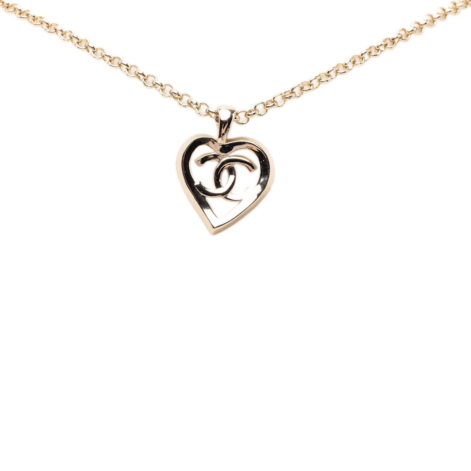 Chanel heart pendant necklace gold plated CC logo: Chanel heart pendant necklace gold plated CC logo This Chanel necklace features a gold-tone chain paired with a heart-shaped pendant adorned with the iconic CC logo. It is secured with a lobster clasp