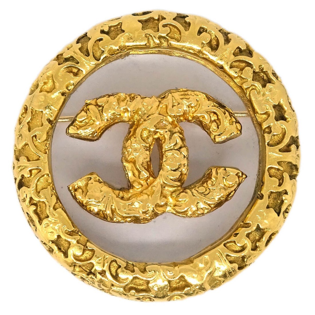 CHANEL 95A Round Gold Plated Medallion Brooch Pin: CHANEL 95A Round Gold Plated Medallion Brooch Pin Round Chanel medallion brooch pin in gold-plated metal with clear acrylic accents. Marked 95A and made in France, this brooch features a decorative me