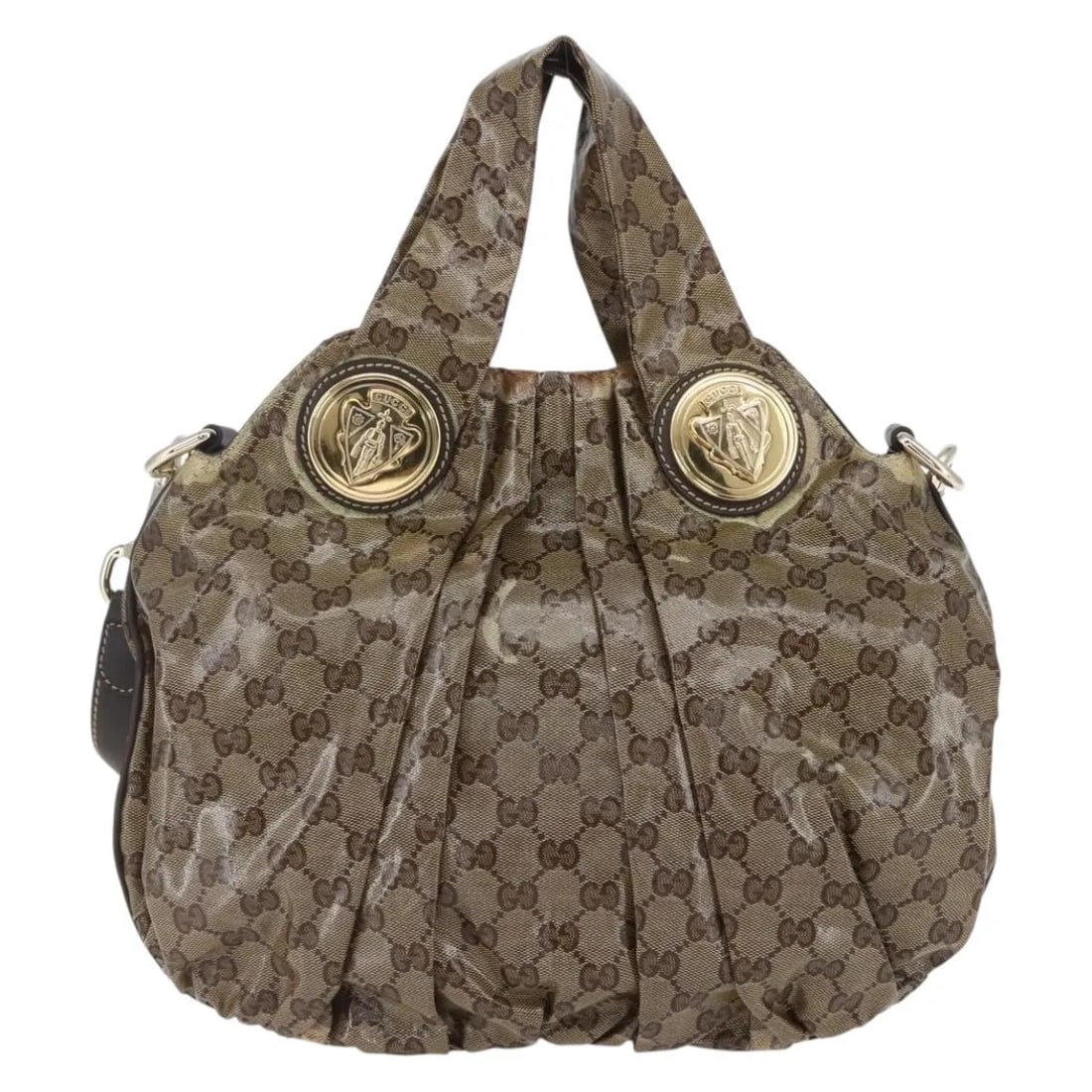 Hysteria Convertible Beige Canvas Top Handle Bag by Gucci: Hysteria Convertible Beige Canvas Top Handle Bag by Gucci The Gucci Hysteria Convertible Top Handle Bag is crafted from beige GG coated canvas and designed for women. This Italian-made bag features a 