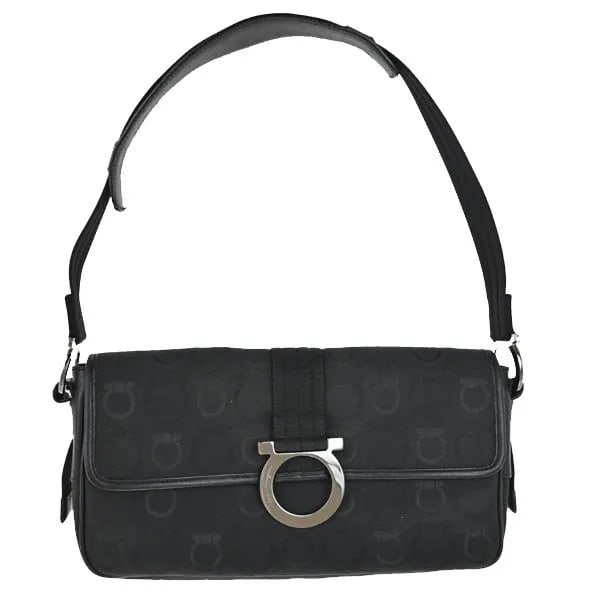 Black Canvas Shoulder Bag Salvatore Ferragamo Gancini: Black Canvas Shoulder Bag Salvatore Ferragamo Gancini This Salvatore Ferragamo Gancini shoulder bag is crafted from black canvas and designed for women. It features the signature Gancini style and is 