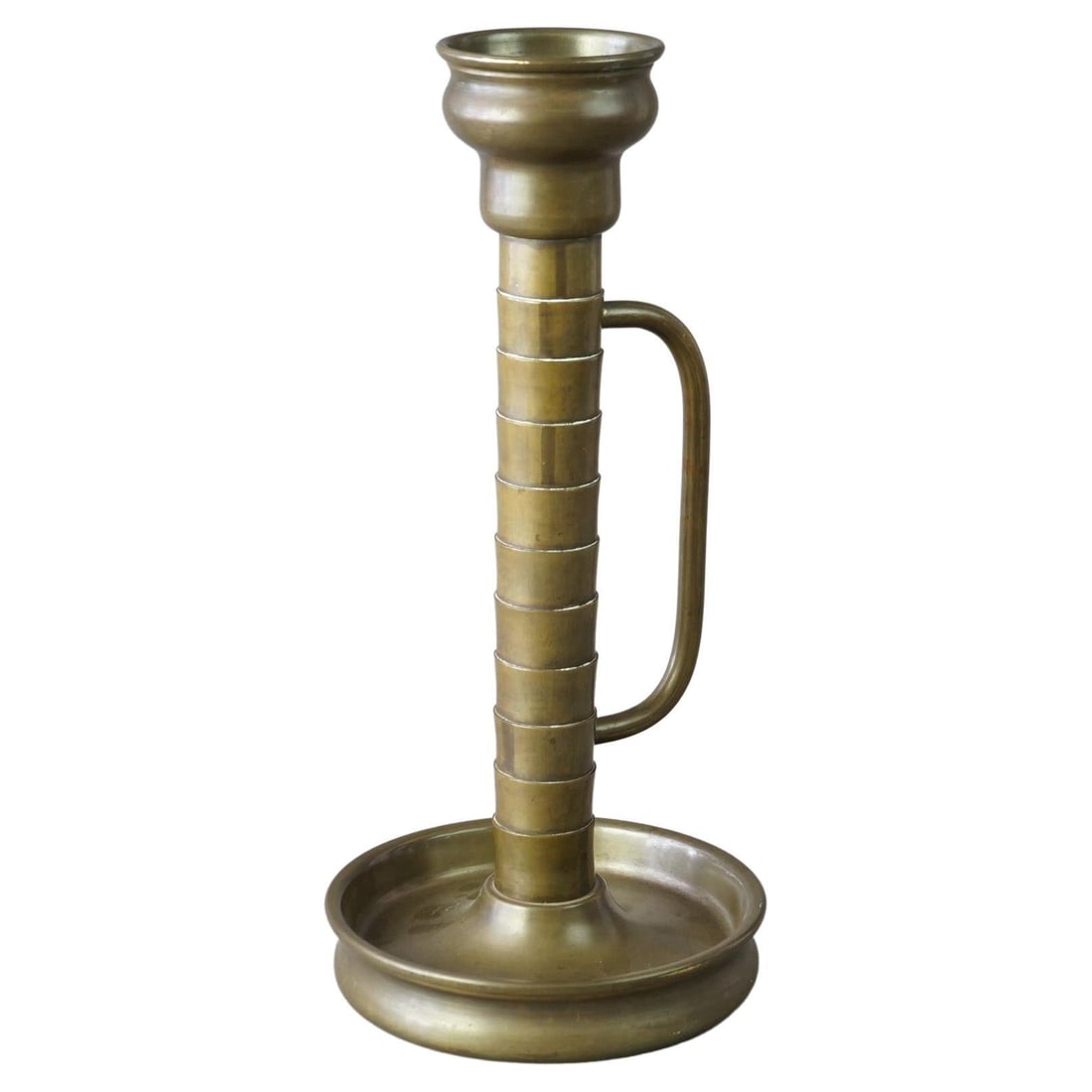 Oversized Antique Brass Mission Candlestick by Vincent C1915: Oversized Antique Brass Mission Candlestick by Vincent C1915 Discover a magnificent antique candlestick that embodies the essence of the Arts and Crafts movement. This large Mission style candlestick,