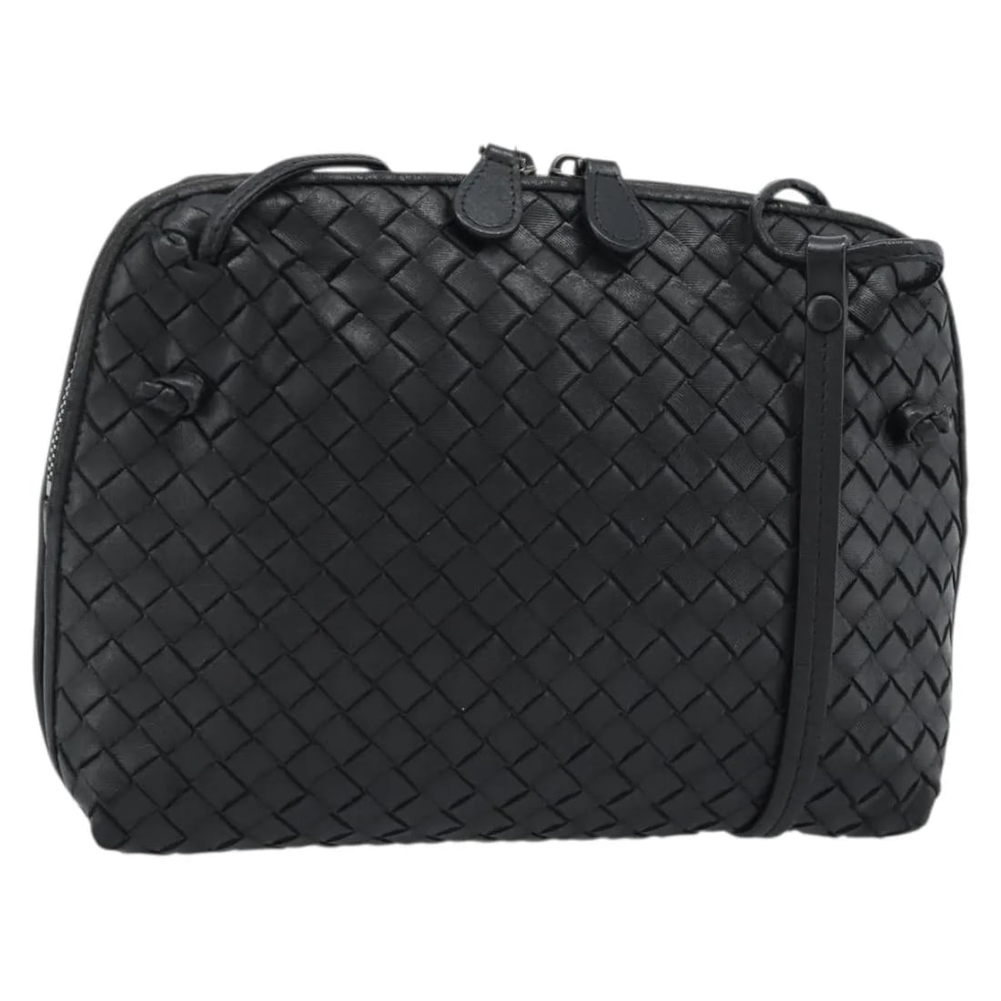 Black Leather Crossbody Bag Bottega Veneta Nodini Intrecciato: Black Leather Crossbody Bag Bottega Veneta Nodini Intrecciato This Bottega Veneta Nodini Crossbody Bag features the signature Intrecciato Nappa leather in black. Designed for women, it offers a compac