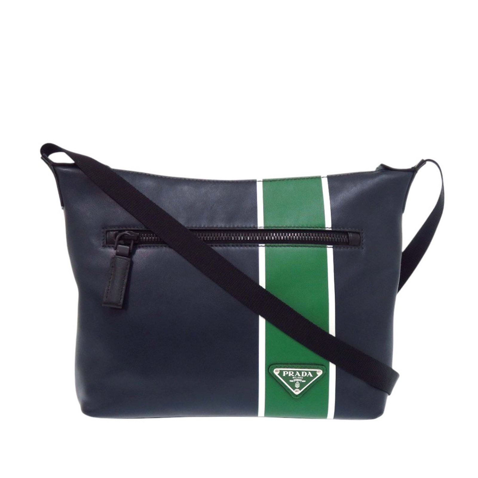 Prada Leather Blue Crossbody Bag with Zip Pocket: Prada Leather Blue Crossbody Bag with Zip Pocket Prada leather crossbody bag in blue with a streamlined design. It features a flat shoulder strap, top zip closure, one exterior zip pocket, and one int
