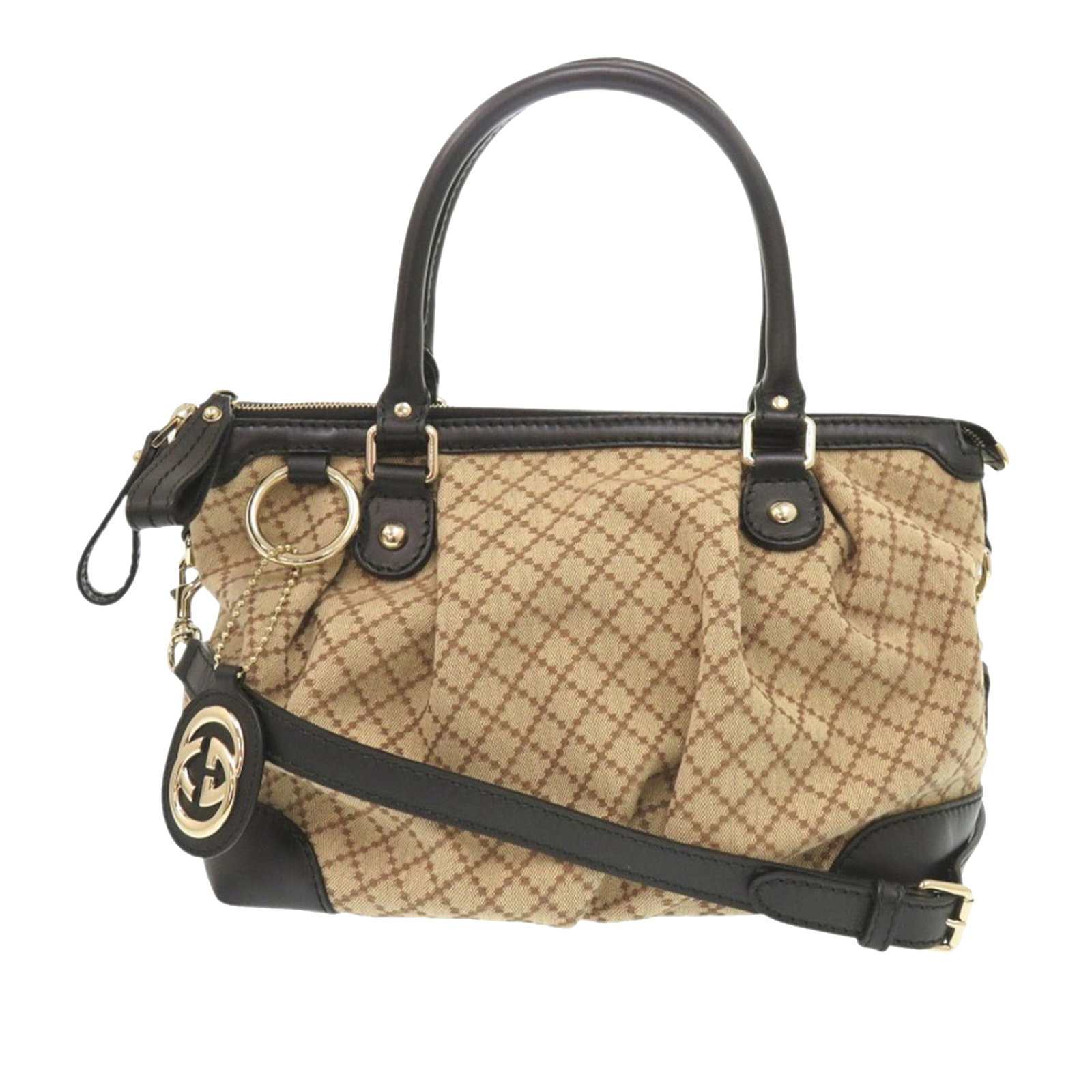 Gucci Sukey Satchel in Beige Diamante Canvas: Gucci Sukey Satchel in Beige Diamante Canvas Gucci Diamante Canvas Sukey Satchel in beige with leather trim. This satchel features rolled leather handles, a flat leather strap, a top zip closure, and 