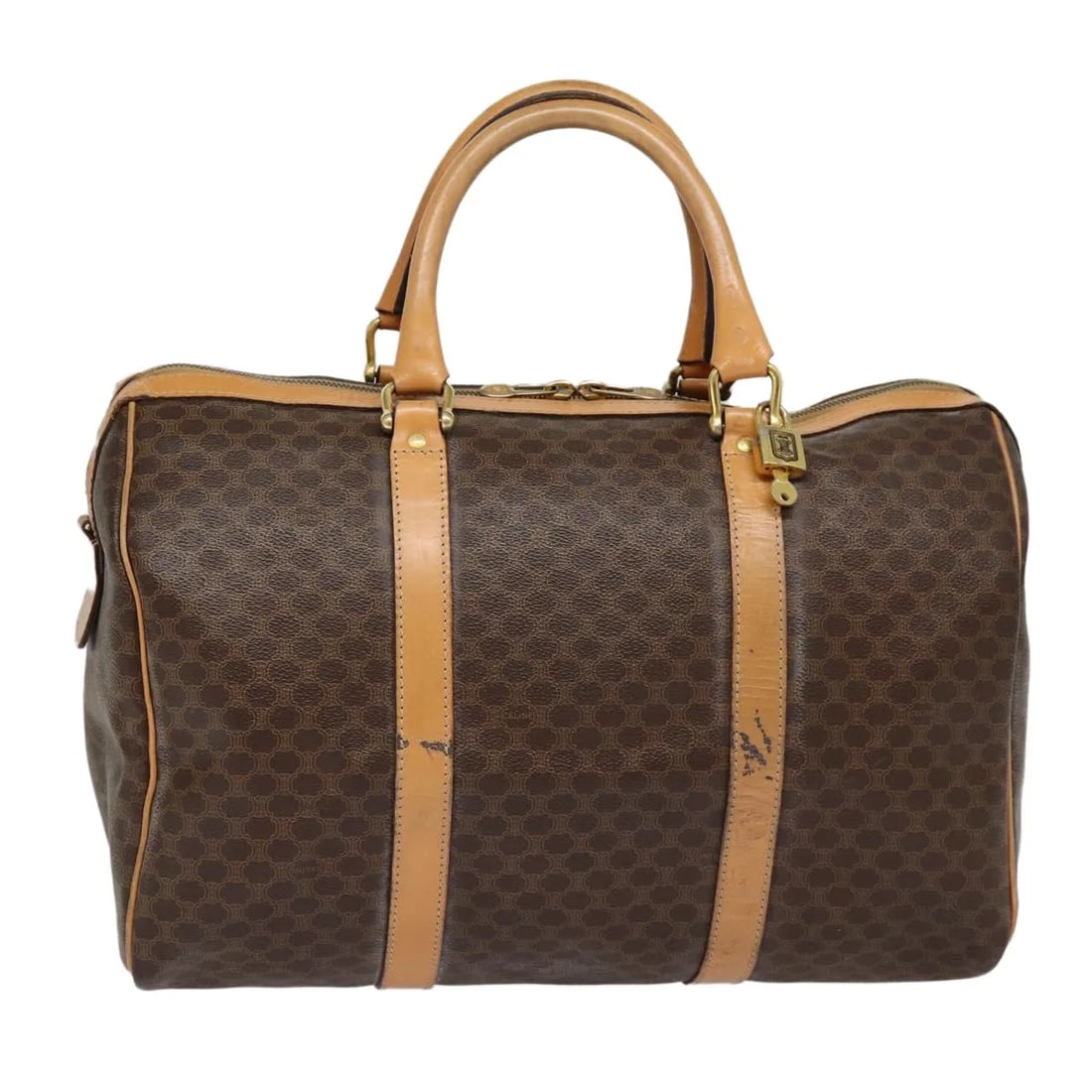 Celine Macadam Coated Canvas Vintage Duffle Bag: Celine Macadam Coated Canvas Vintage Duffle Bag This Celine Vintage Duffle Bag features the iconic Macadam pattern in brown coated canvas. Designed for unisex use, it is crafted in France and offers a