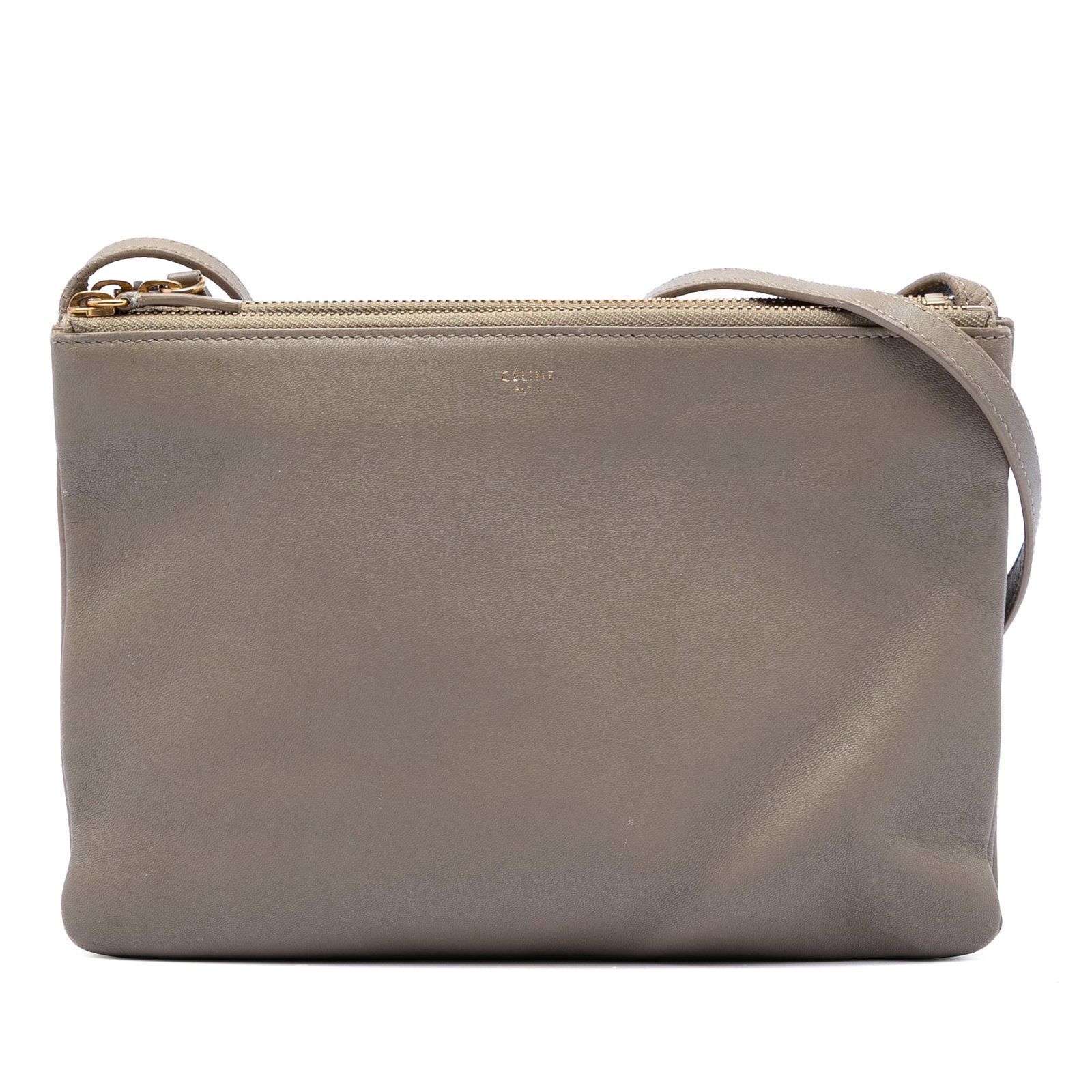 Celine Trio Lambskin Crossbody Bag: Celine Trio Lambskin Crossbody Bag This Celine Large Lambskin Trio Crossbody features a brown lambskin leather body with a flat leather shoulder strap and triple top zip closures. The bag is crafted i