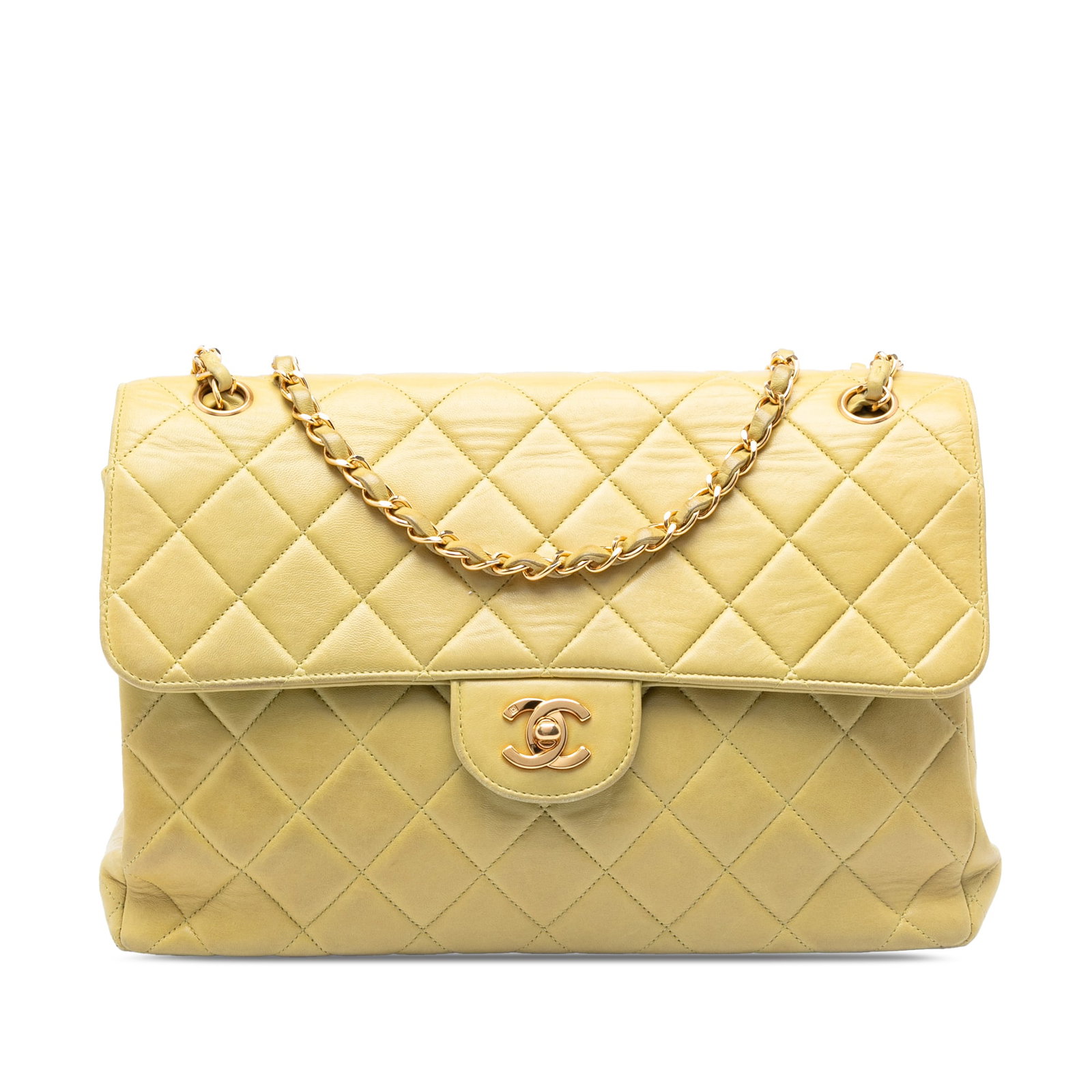 Chanel yellow lambskin flap shoulder bag jumbo quilted: Chanel yellow lambskin flap shoulder bag jumbo quilted This Chanel Jumbo Quilted Lambskin Double Sided Flap shoulder bag is crafted from quilted lambskin leather in yellow, featuring leather-woven cha