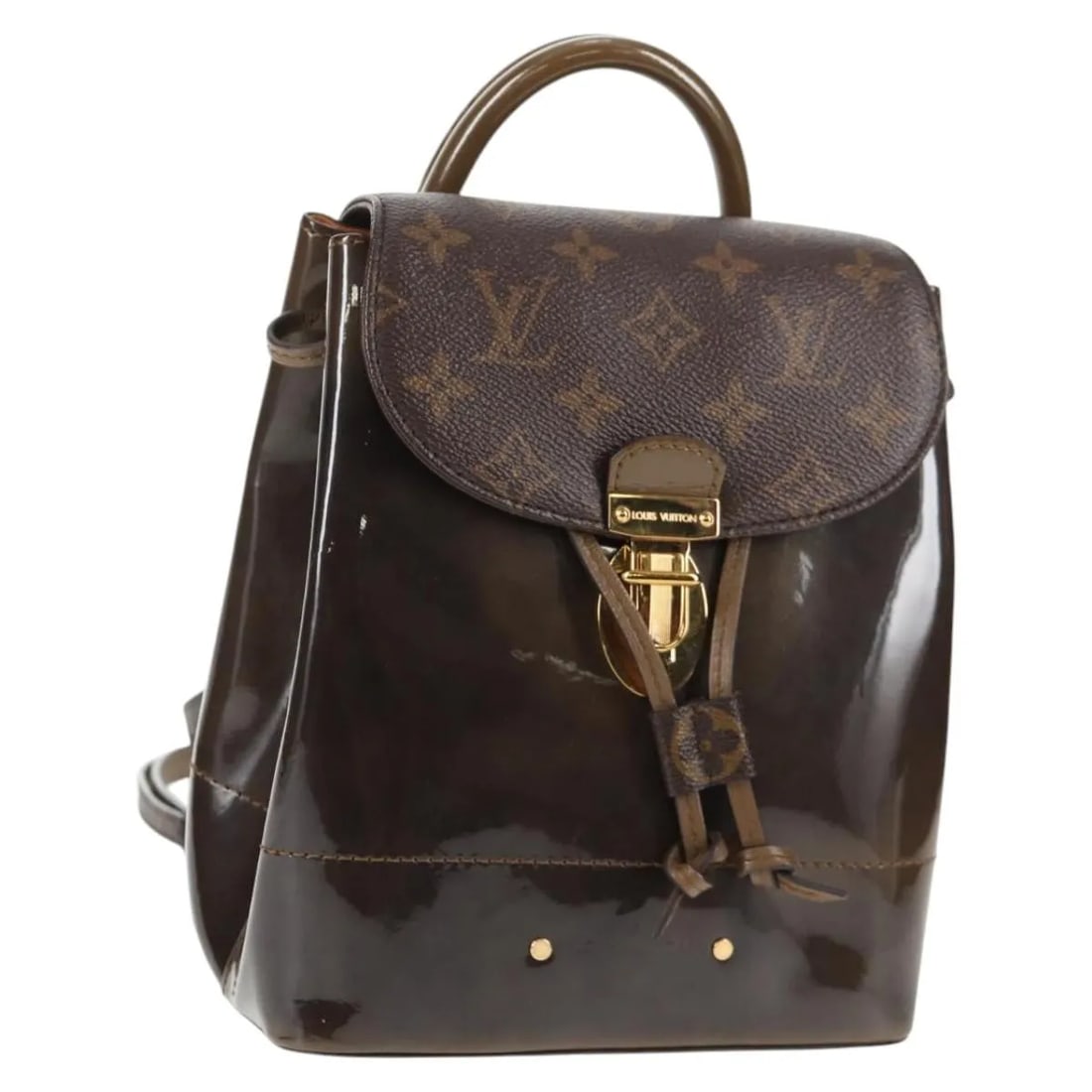 Louis Vuitton Hot Springs Brown Monogram Canvas Bag: Louis Vuitton Hot Springs Brown Monogram Canvas Bag Louis Vuitton Hot Springs bag in brown canvas. This item is in good condition with natural patina, light marks, light wear, and a corner crack on th