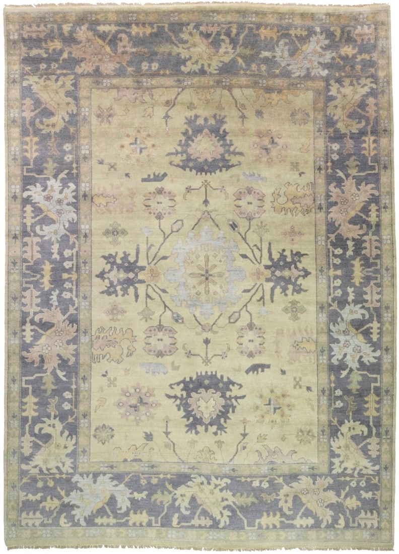 10'0 x 13'7 Hand-Knotted Wool Floral Oushak Rug in Beige and Taupe: 10'0 x 13'7 Hand-Knotted Wool Floral Oushak Rug in Beige and Taupe This handmade Oushak rug features a floral pattern in muted beige and taupe tones, offering a traditional style with a modern regiona