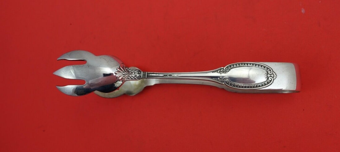 Italian Sterling Empire Pattern Sterling Silver Ice Tongs 6 1/4": Italian Sterling Empire Pattern Sterling Silver Ice Tongs 6 1/4" Enhance your serving experience with these exquisite Empire ice tongs crafted from high-quality Italian sterling silver. Measuring 6 1/