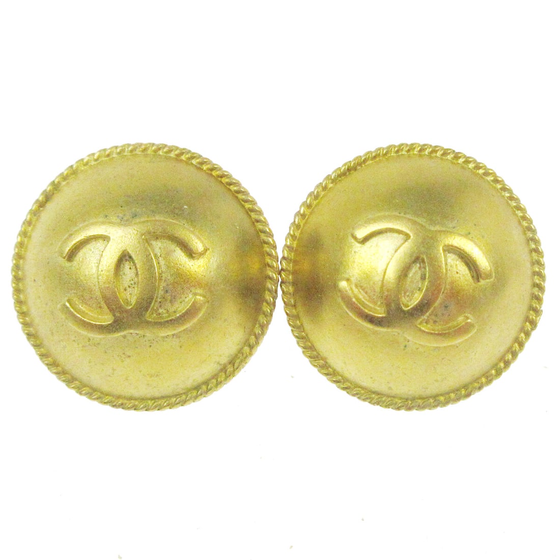 Chanel 95P Gold Tone CC Logo Clip-On Button Earrings: Chanel 95P Gold Tone CC Logo Clip-On Button Earrings Pair of Chanel clip-on button earrings featuring the interlocking CC logo in a gold-tone finish. Made in France, these earrings have a classic logo
