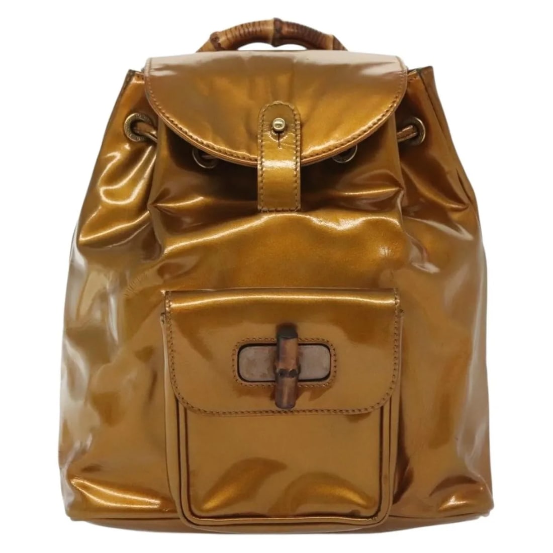 Gucci Vintage Bamboo Patent Leather Backpack Gold: Gucci Vintage Bamboo Patent Leather Backpack Gold This vintage Gucci bamboo backpack features a gold patent leather exterior and bamboo handle, embodying classic Italian craftsmanship. Designed for wo
