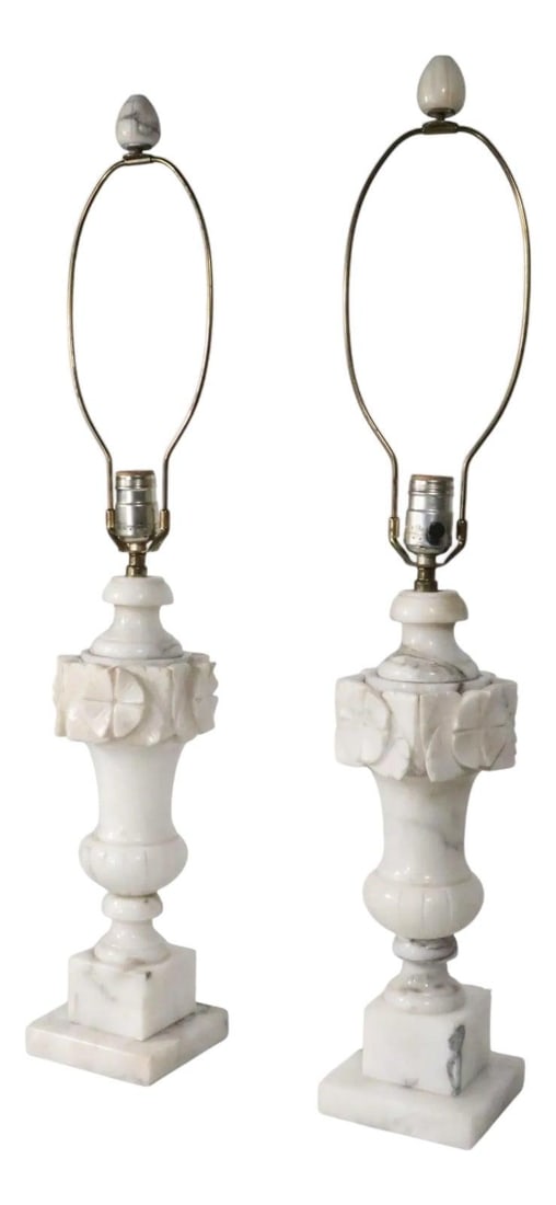 Pair of Italian Carved Marble Urn Table Lamps: Pair of Italian Carved Marble Urn Table Lamps This pair of mid-20th century Italian table lamps is crafted from carved marble or alabaster. Each lamp features an urn-shaped body adorned with a ring of