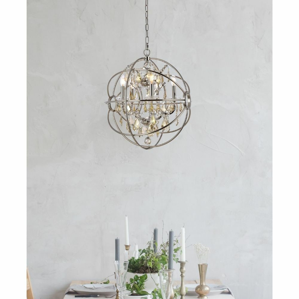 Geneva 5 Light Polished Nickel Crystal Chandelier 20 inch: Geneva 5 Light Polished Nickel Crystal Chandelier 20 inch This modern chandelier features a polished nickel metal frame adorned with golden teak color crystals, creating a striking orb/globe design. W