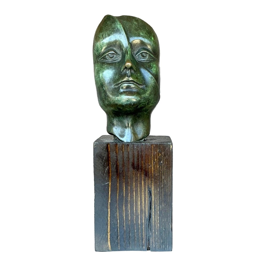 Late 20th Century Bronze Abstract Woman Sculpture with Wood Base: Late 20th Century Bronze Abstract Woman Sculpture with Wood Base Experience the captivating allure of this late 20th century vintage bronze abstract sculpture, elegantly portraying a woman's head. Cra