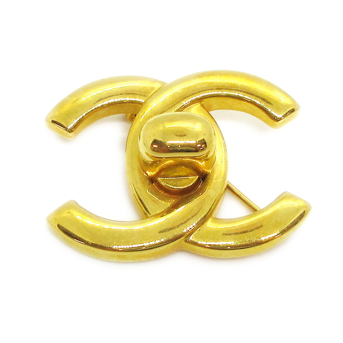 Chanel CC Turnlock Logo Brooch Gold Tone 96A: Chanel CC Turnlock Logo Brooch Gold Tone 96A Small Chanel turnlock brooch pin featuring the CC logo motif in a gold-tone finish. Made in France, this brooch is marked 96A and presents in very good con