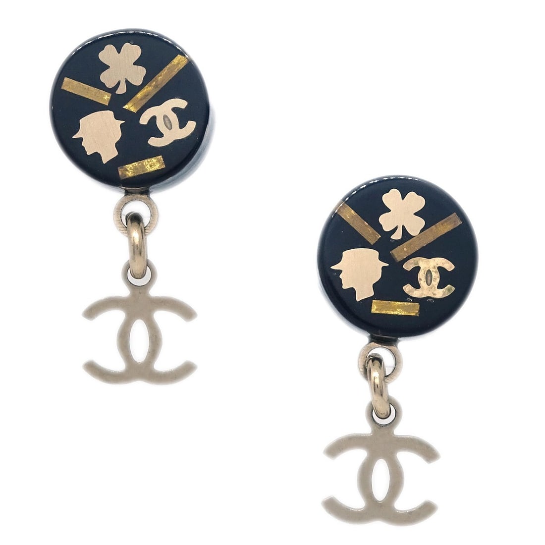 CHANEL 06A gold plated pierced earrings with black acrylic: CHANEL 06A gold plated pierced earrings with black acrylic Pair of Chanel pierced earrings in gold and black with a dangling logo design. Made in France, these earrings feature gold-plated metal and a