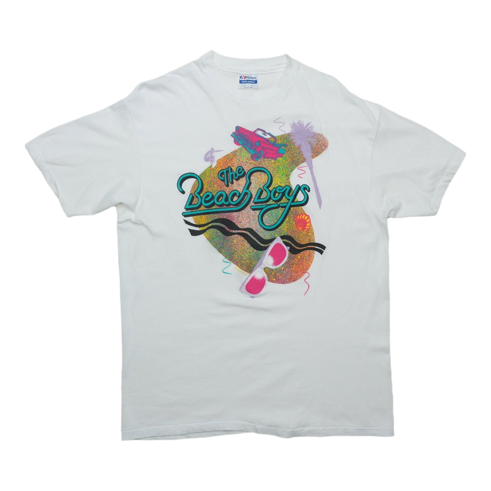 Vintage Beach Boys 1980s Cotton Graphic Tee XL: Vintage Beach Boys 1980s Cotton Graphic Tee XL This is an original vintage Beach Boys shirt from the 1980s, featuring a front graphic only. Made from 100% cotton in white, the shirt is in excellent co