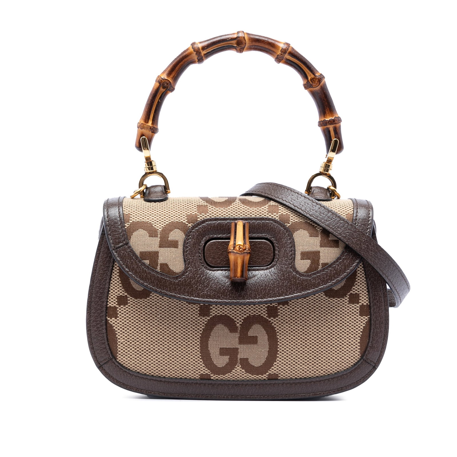 Gucci Bamboo 1947 Small Top Handle Bag in Jumbo GG Canvas: Gucci Bamboo 1947 Small Top Handle Bag in Jumbo GG Canvas Gucci Small Jumbo GG Canvas Bamboo 1947 Top Handle Bag in beige canvas with leather trim and a bamboo top handle. The bag features a detachabl