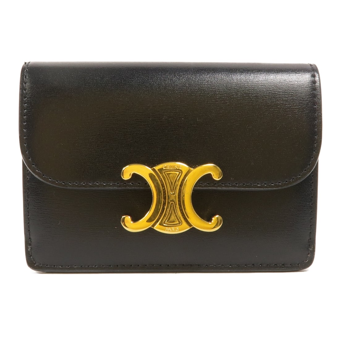 CELINE Triomphe Black Calfskin Card Case: CELINE Triomphe Black Calfskin Card Case CELINE Triomphe card holder in black calfskin leather. This unisex card case offers a compact, streamlined design and is presented in very good condition. Spec