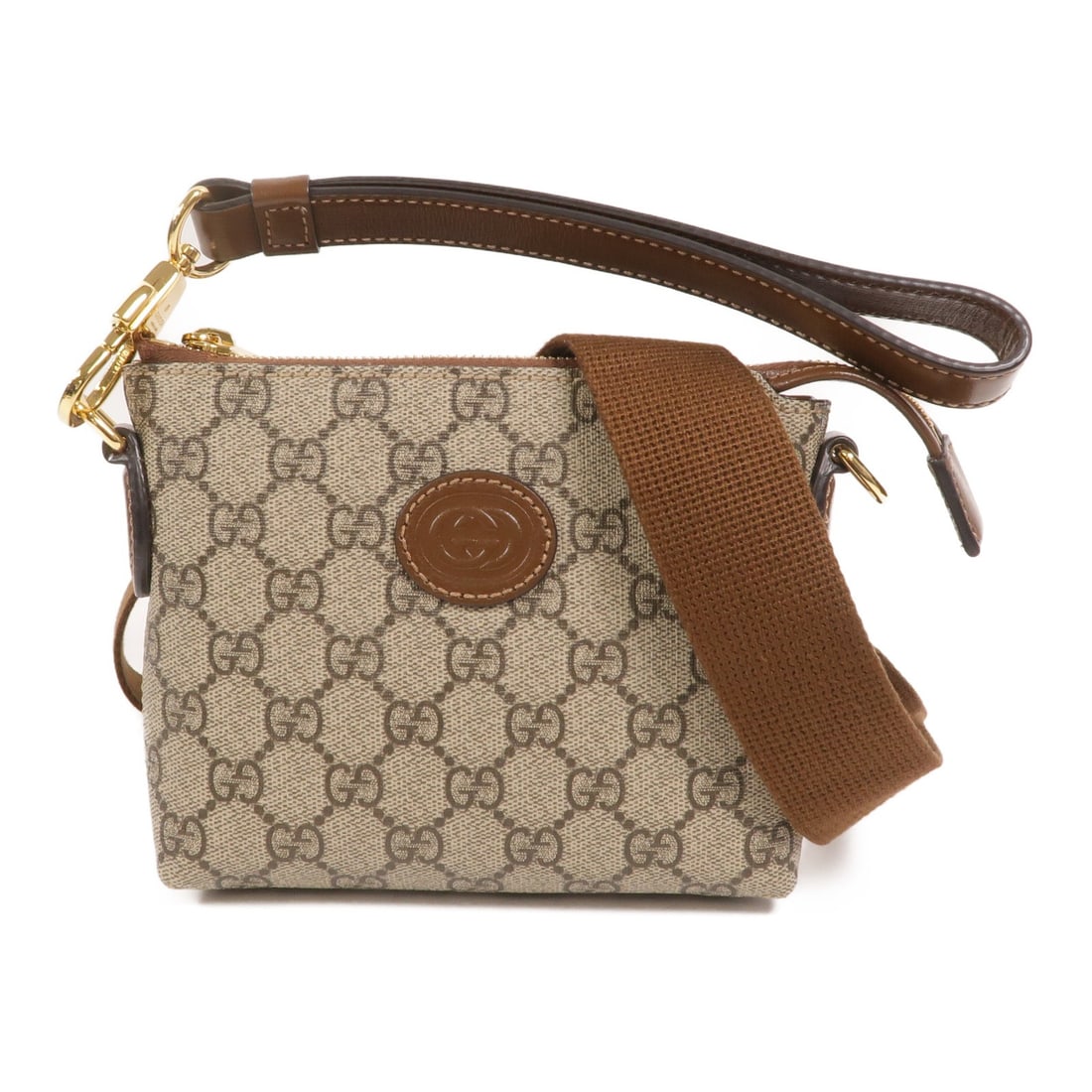 Gucci Interlocking G GG messenger shoulder bag brown coated canvas: Gucci Interlocking G GG messenger shoulder bag brown coated canvas This Gucci 2-way shoulder bag features the iconic GG interlocking design and is crafted from durable brown PVC coated canvas. Designe